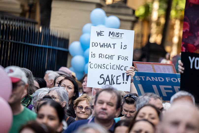 Thousands gather outside NSW Parliament House to protest against an extreme bill to allow the NSW Health Minister to force Catholic hospitals to provide abortions and remove conscientious objection rights from health care practitioners. Photo: Alphonsus Fok